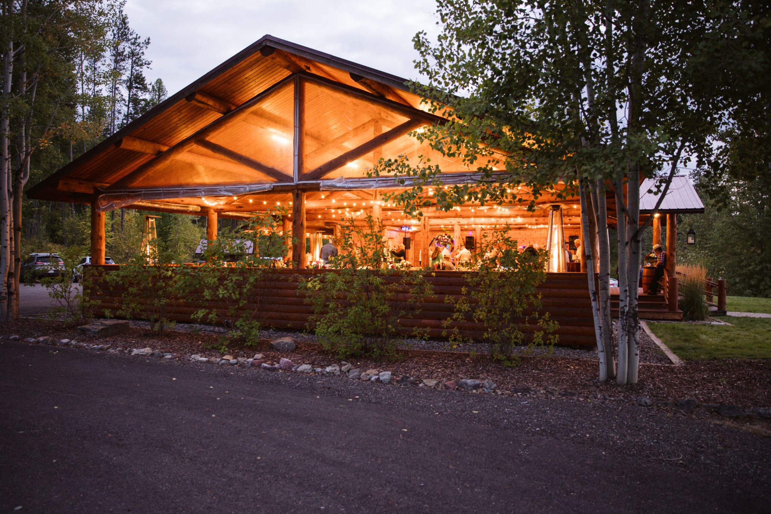 Covered pavilion during evening at Paddle Ridge wedding. 