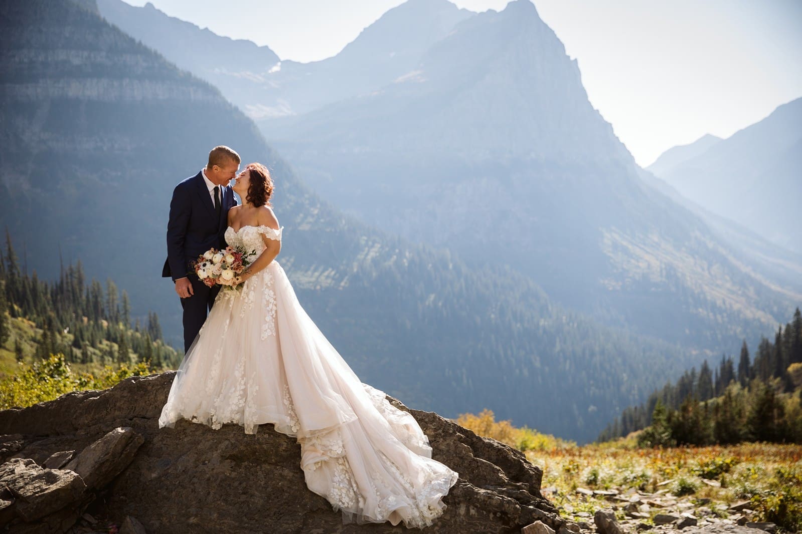 Bride and groom pose for photos at Big Bend during their Montana wedding day.