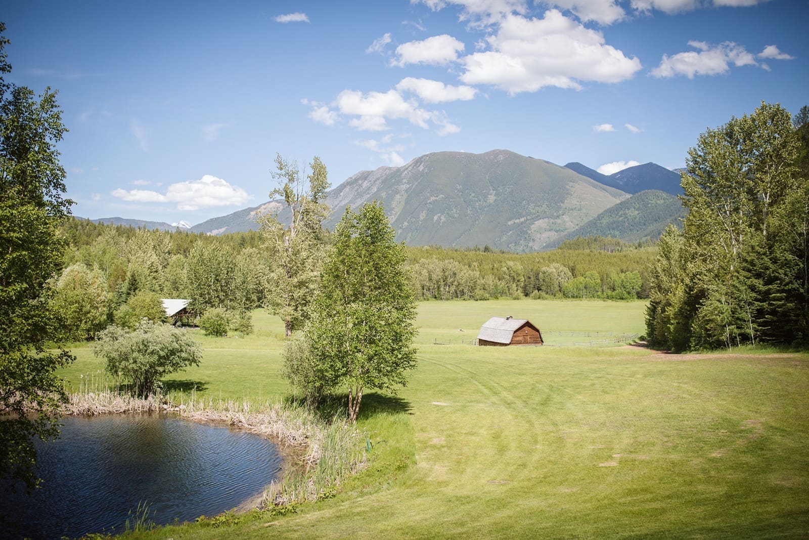 pond and valley at Green Valley Ranch wedding venue in Kalispell, Montana.