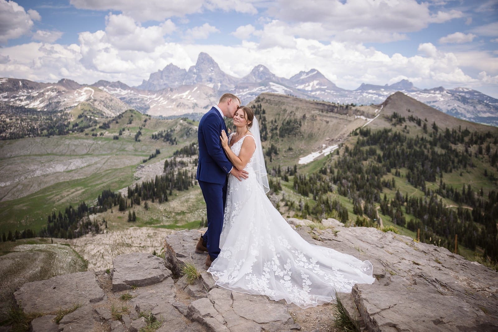 Bride and groom kissing during Grand Targhee wedding photos. 